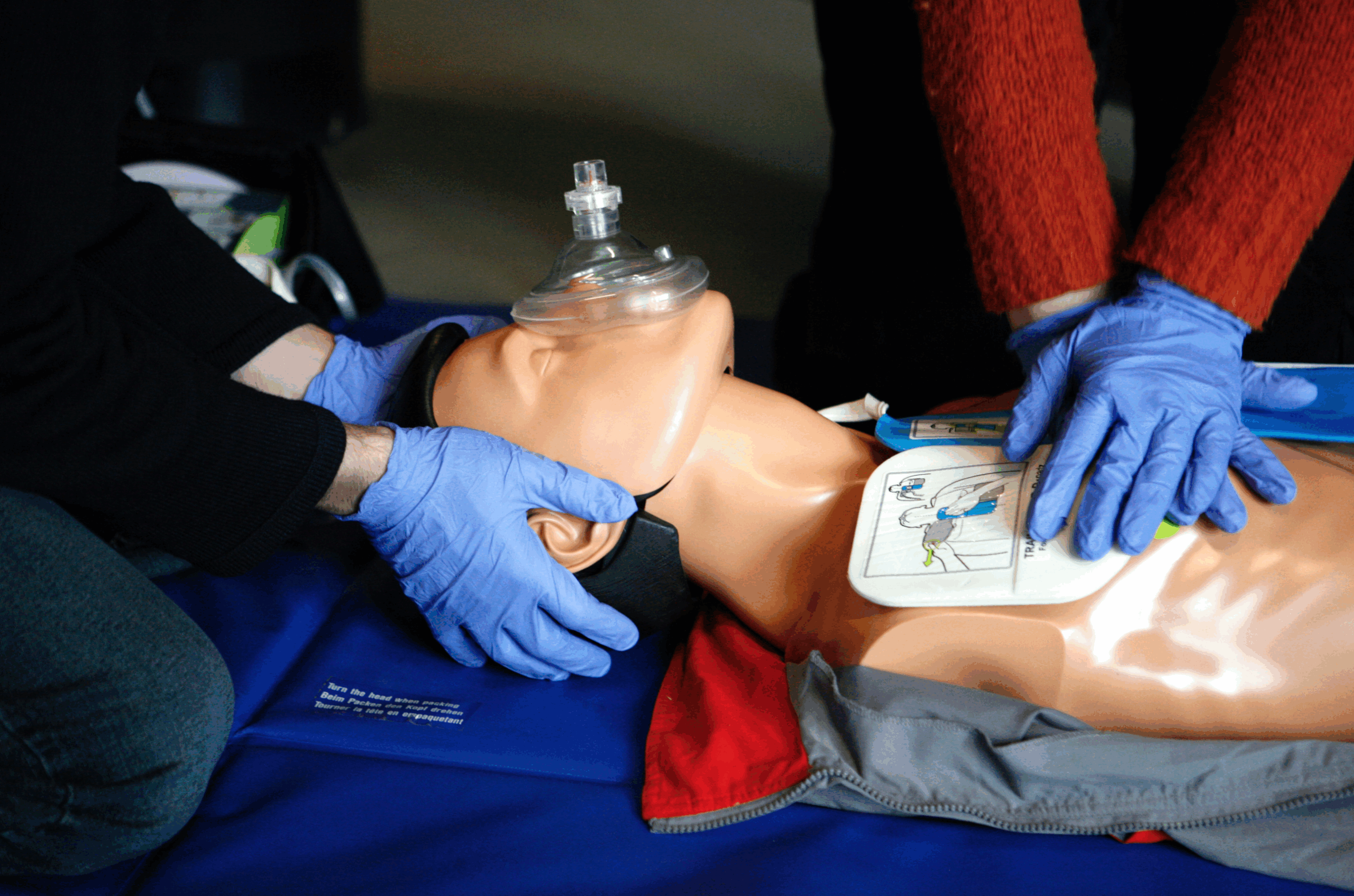 a person who is training cpr